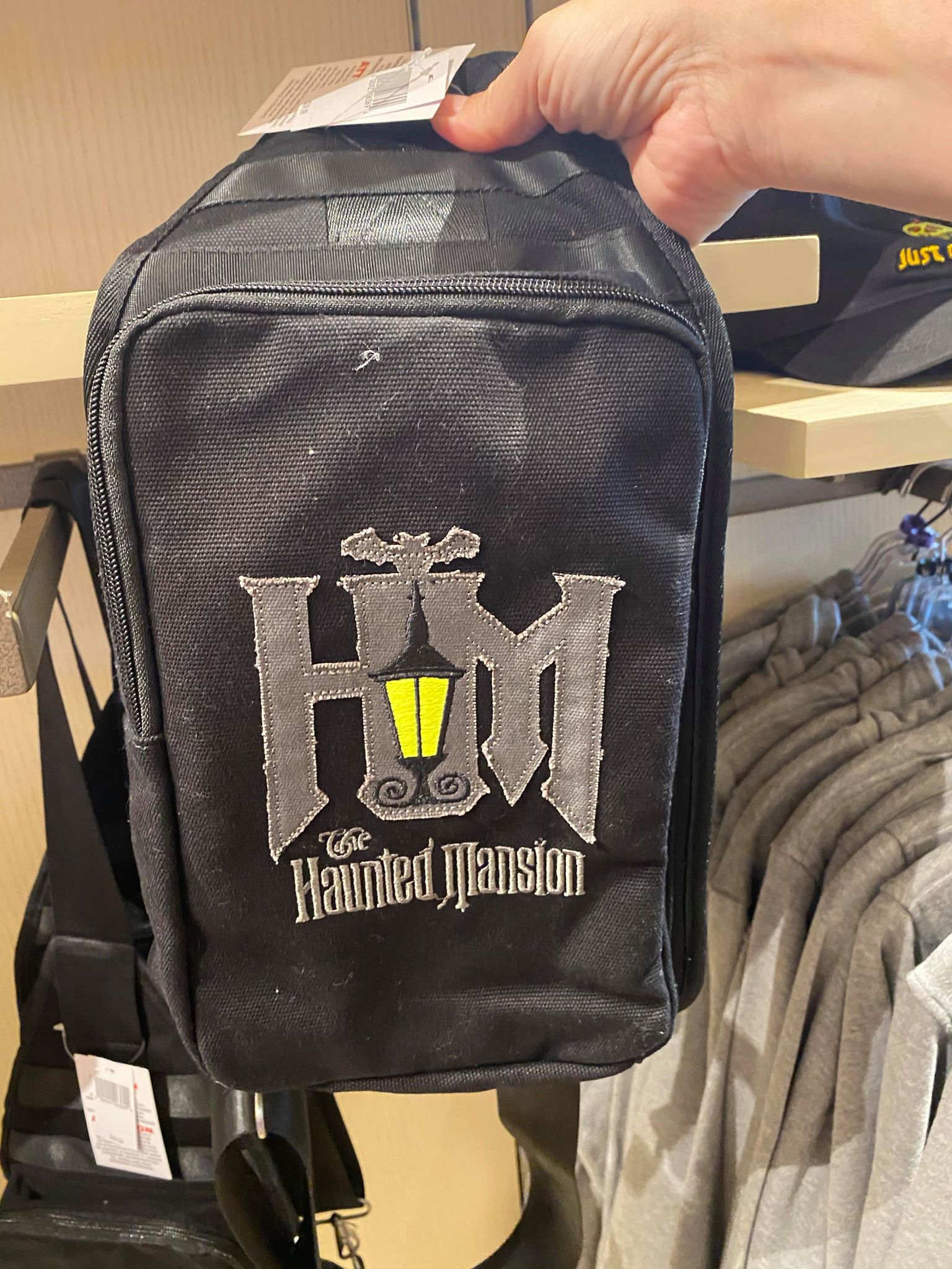 haunted mansion sling bag