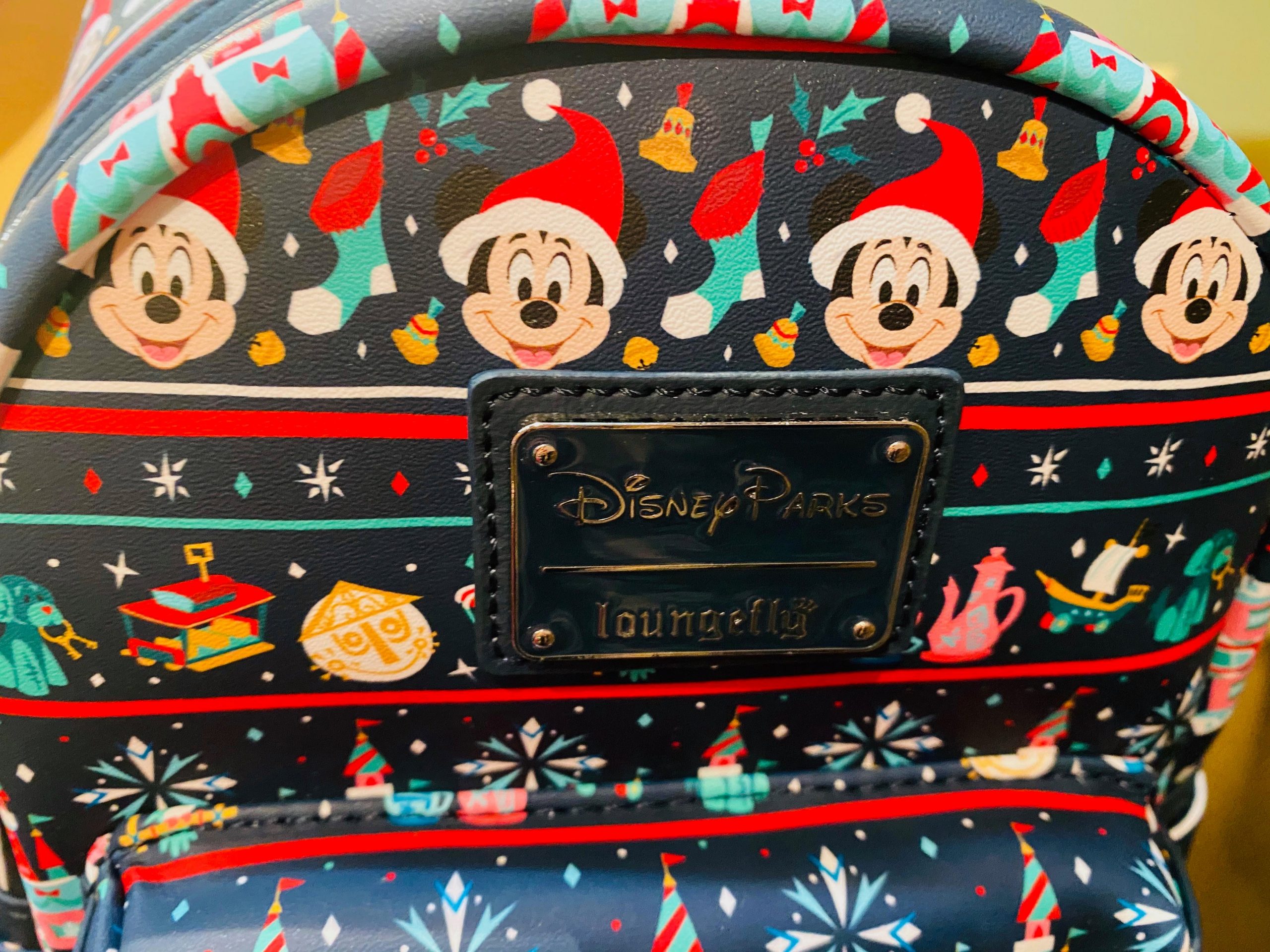 Festive Christmas Disney Loungefly is on our list! Disney Fashion Blog